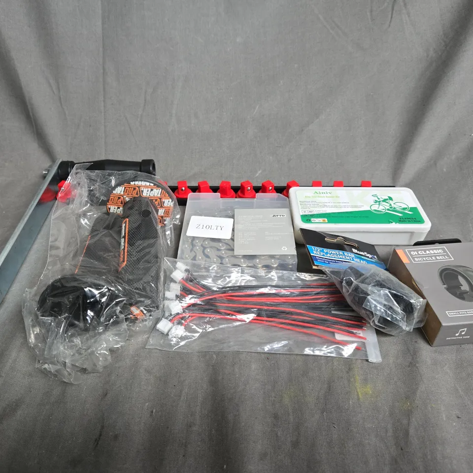 APPROXIMATELY 10 ASSORTED VEHICLE PARTS TO INCLUDE BIKE CHAINS, BIKE TIRE PATCH REPAIR KIT