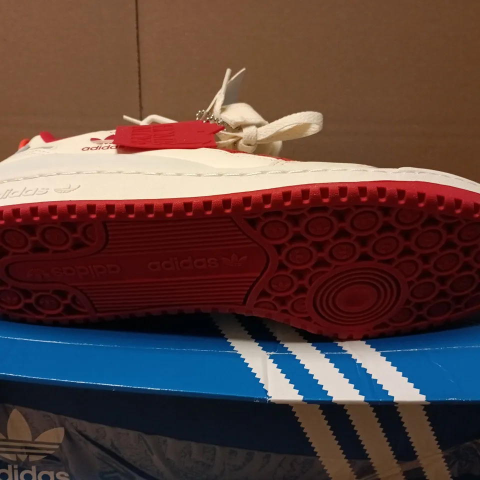 BOXED PAIR OF ADIDAS FORUM HOME ALONE TRAINERS IN WHITE - UK 11