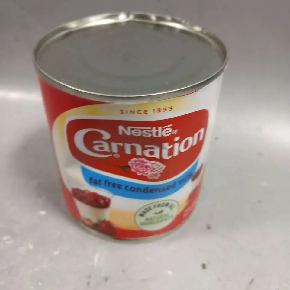 APPROXIMATELY 10 CANS OF NESTLE CARNATION FAT FREE CONDENSED MILK 405G