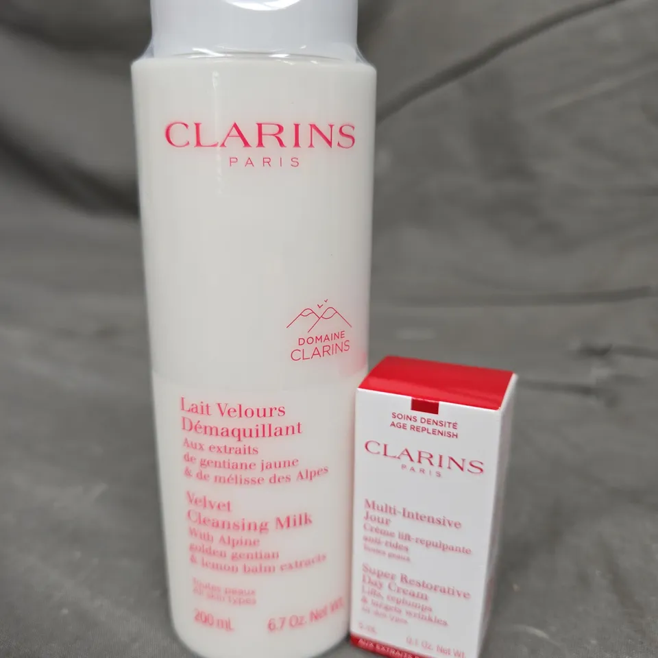 2 CLARINS PRODUCTS TO INCLUDE VELVET CLEANSING MILK 200ML & SUPER RESTORATIVE DAY CREAM 5ML