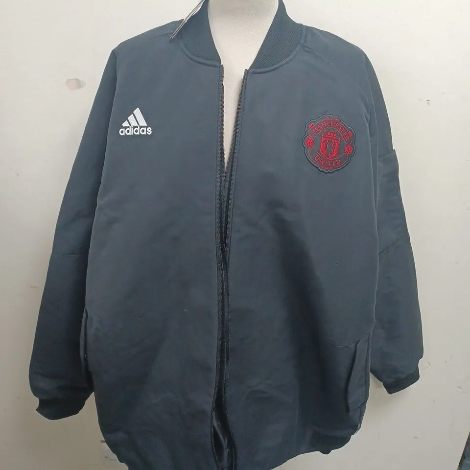 MUFC TRV JACKET IN BLACK - UK 2XL