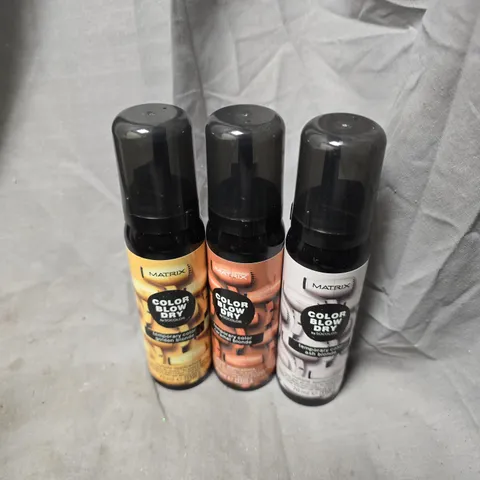 APPROXIMATELY 20 ASSORTED MATRIX BLOW DRY SPRAYS TO INCLUDE ASH BLONDE, CARAMEL BLONDE, GOLDEN BLONDE, ETC - COLLECTION ONLY