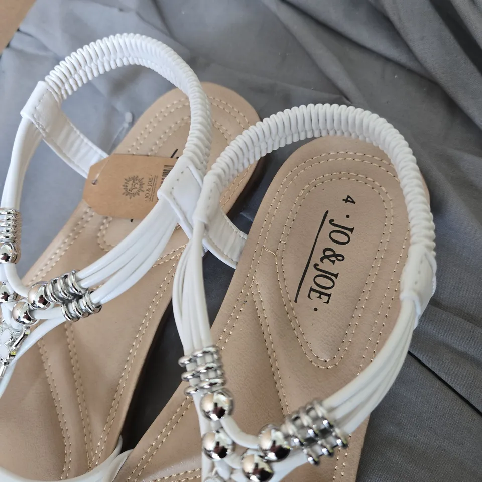 WHITE STRAPPY SANDALS WITH CRYSTAL FLOWER EMBELLISHMENTS – UK 4 BY JO AND JOE .