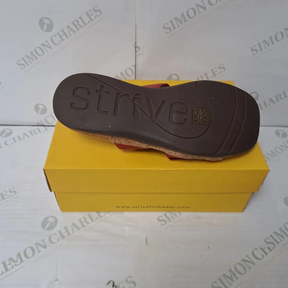 BOXED PAIR OF STRIVE SAMOA TRIPLE STRAP SANDALS IN SCARLET SIZE 9