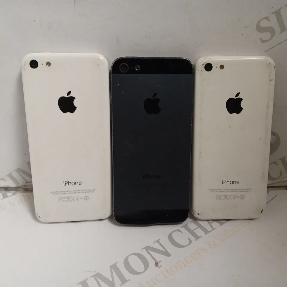 THREE ASSORTED APPLE IPHONE TO INCLUDE MODELS A1507 AND A1429 