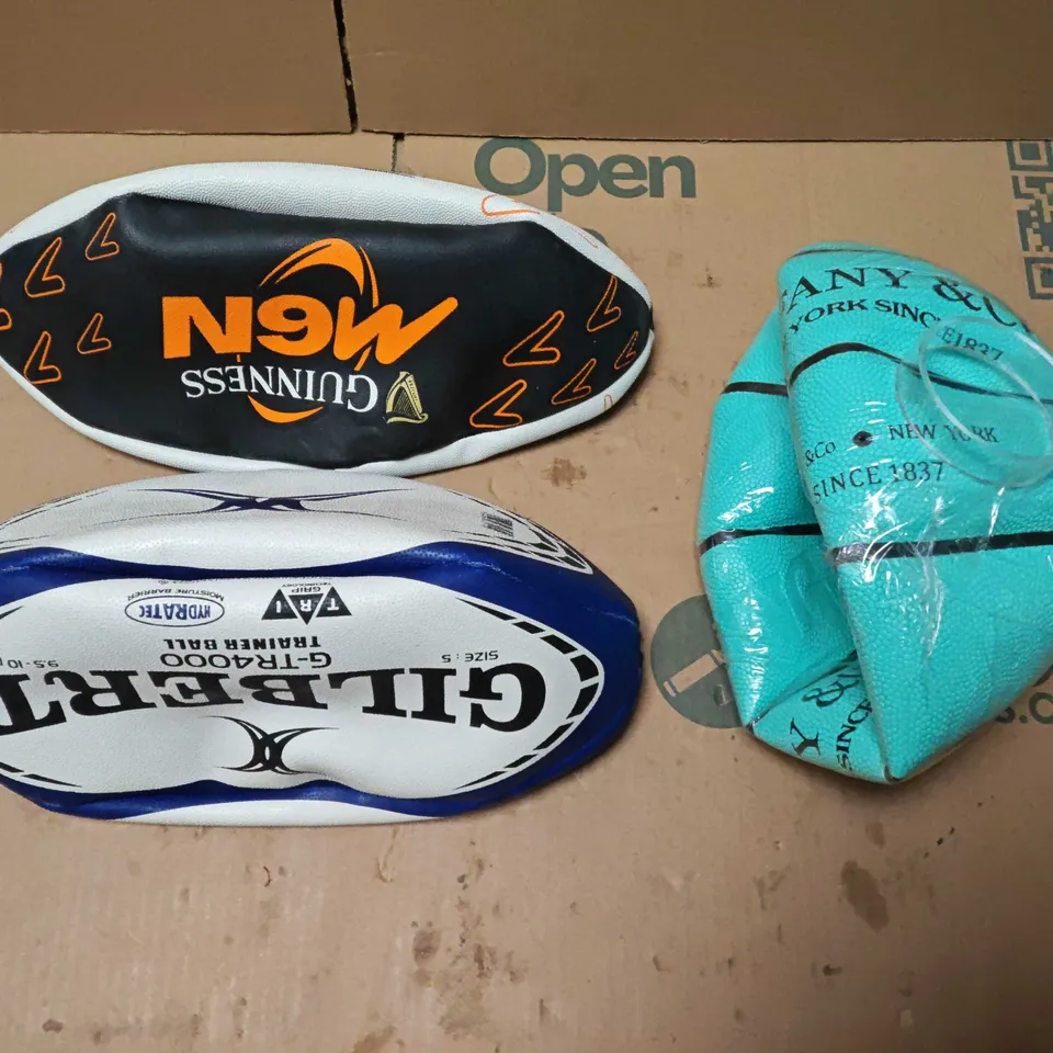 LOT OF 3 ASSORTED SPORTS BALLS TO INCLUDE GILBERT RUGBY BALL AND TIFFANY & CO BASKET BALL