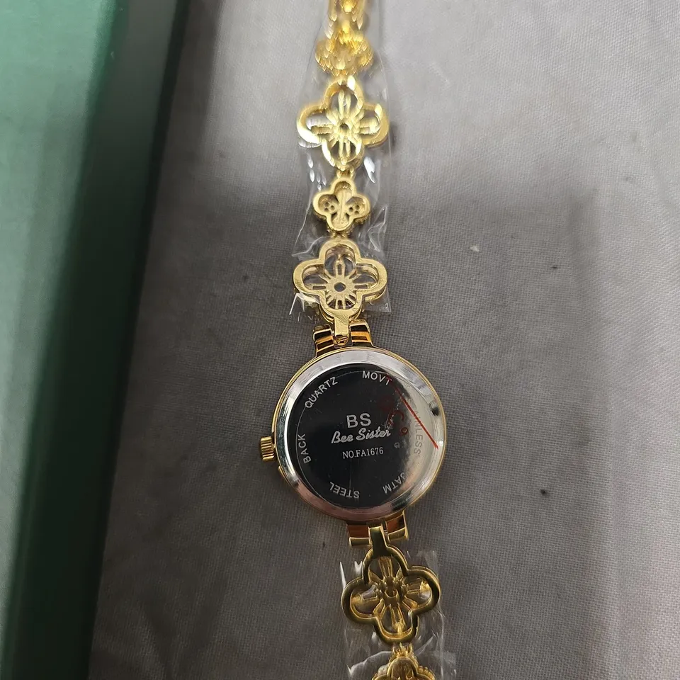 BEE SISTER GOLD-TONE WRISTWATCH WITH FLORAL LINK BRACELET – BOXED, STAINLESS STEEL