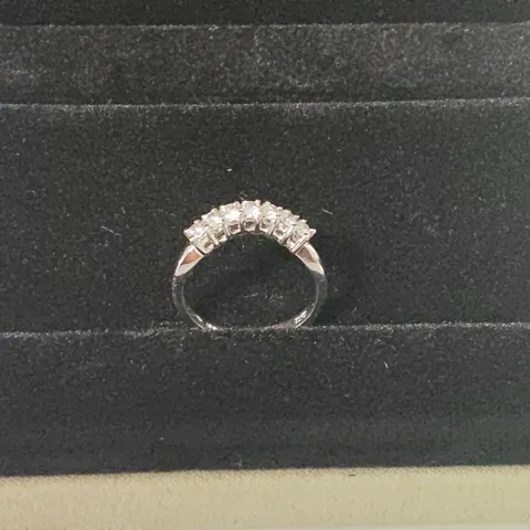 PLATINUM CURVED SEVEN STONE HALF ETERNITY RING SET WITH NATURAL DIAMONDS