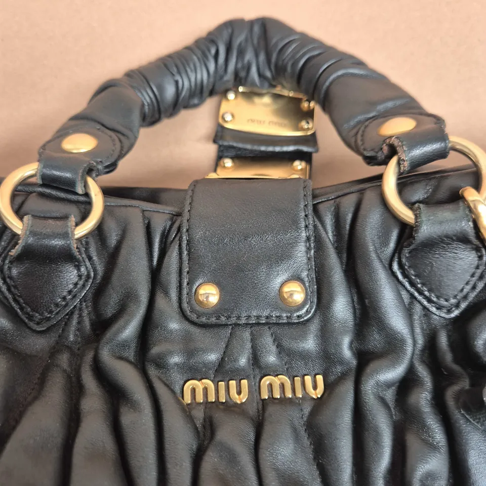 MIU MIU QUILTED LEATHER HANDBAG – BLACK WITH GOLD HARDWARE