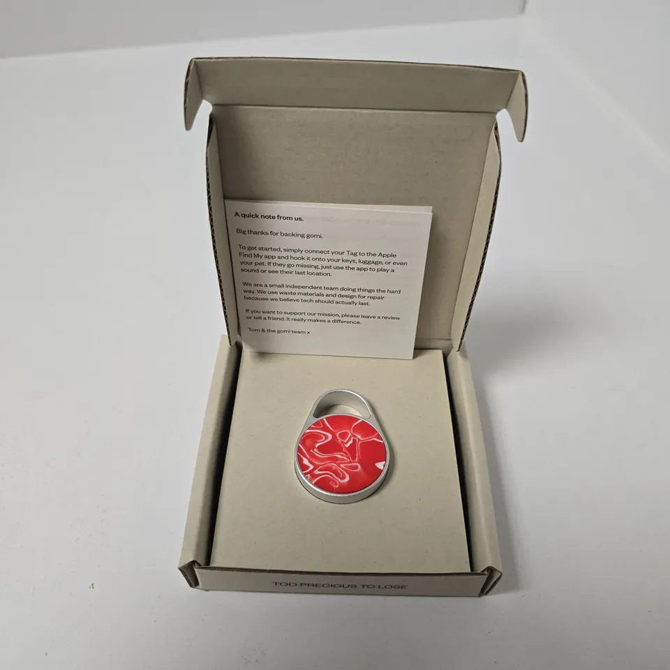 BOXED GOMI ITEM TRACKER TAG IN RED SWIRL