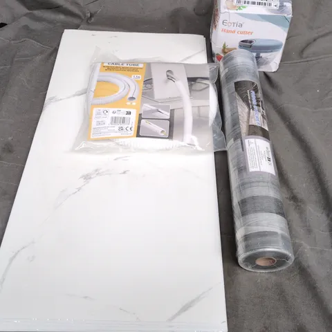 APPROXIMATELY 15 ASSORTED HOUSEHOLD PRODUCTS TO INCLUDE FLOOR STICKER, CABLE TUBE, HAND CUTTER, ETC - COLLECTION ONLY