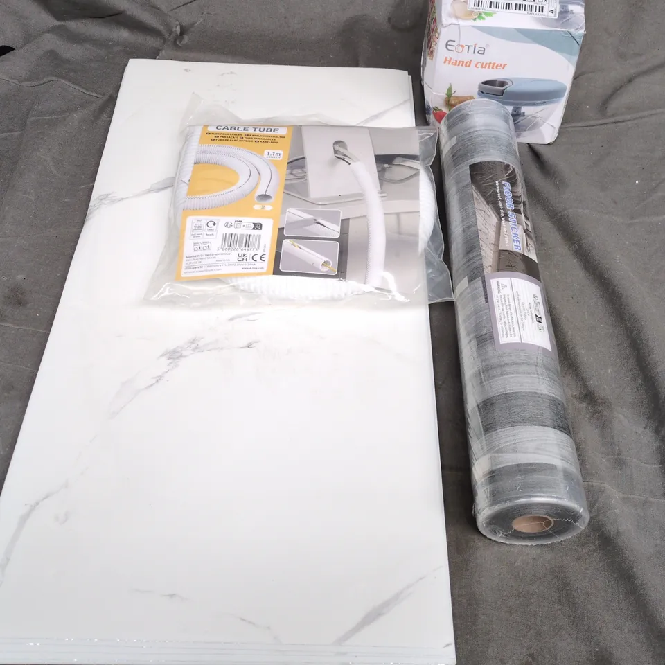 APPROXIMATELY 15 ASSORTED HOUSEHOLD PRODUCTS TO INCLUDE FLOOR STICKER, CABLE TUBE, HAND CUTTER, ETC - COLLECTION ONLY