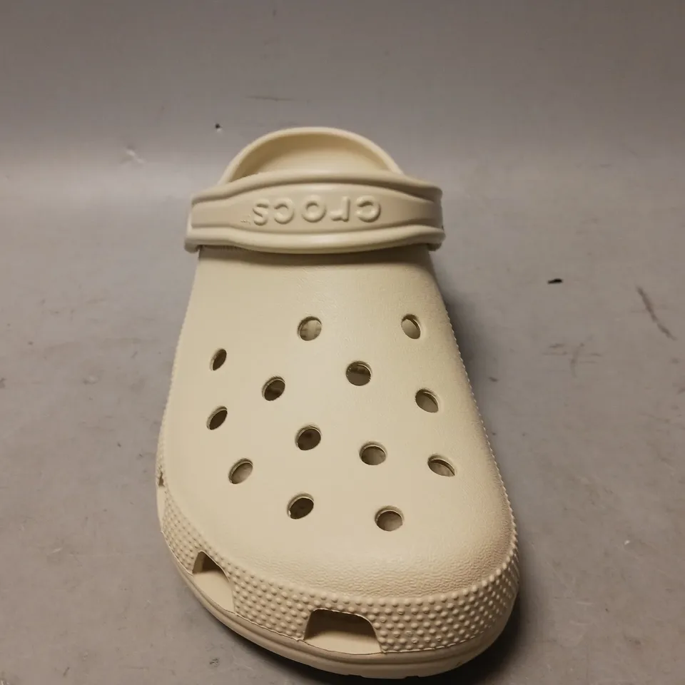 PAIR OF CROCS CLOGS IN BONE UK SIZE 7
