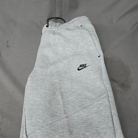 NIKE LOGO TECH TRACKSUIT BOTTOMS SIZE XL