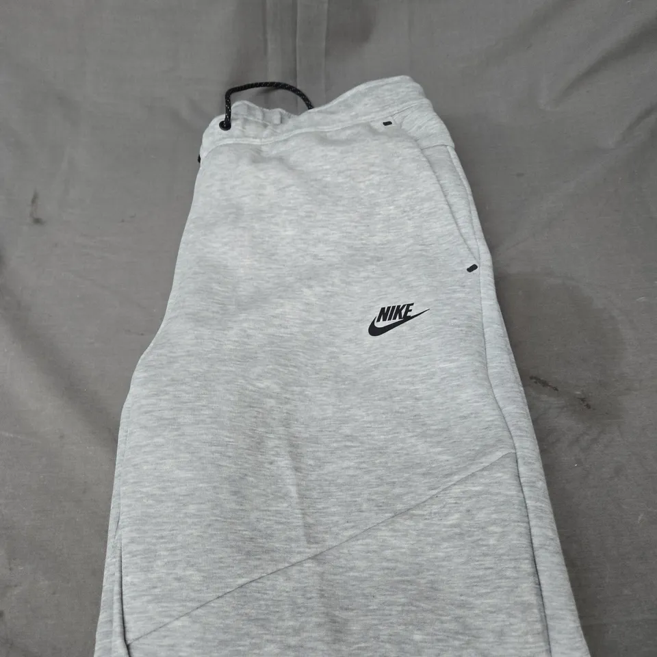 NIKE LOGO TECH TRACKSUIT BOTTOMS SIZE XL