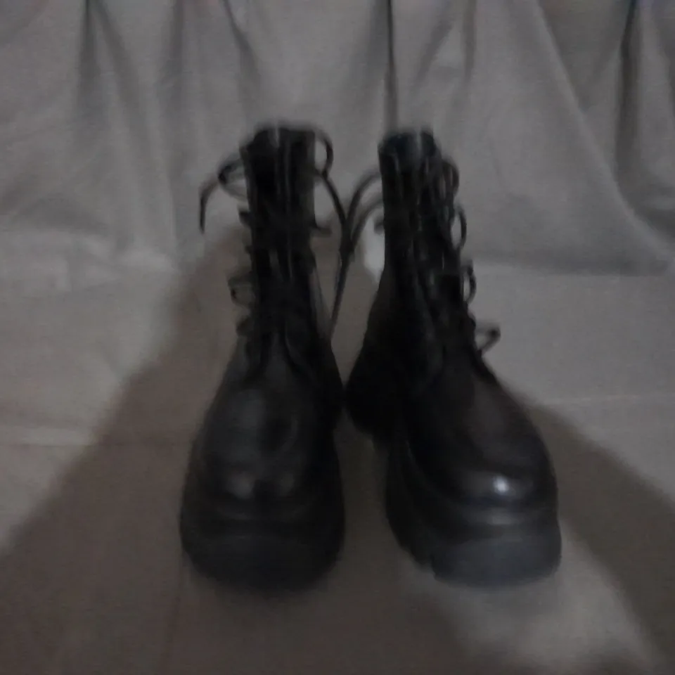 PAIR OF KOI LACE UP BOOTS IN BLACK SIZE 6 