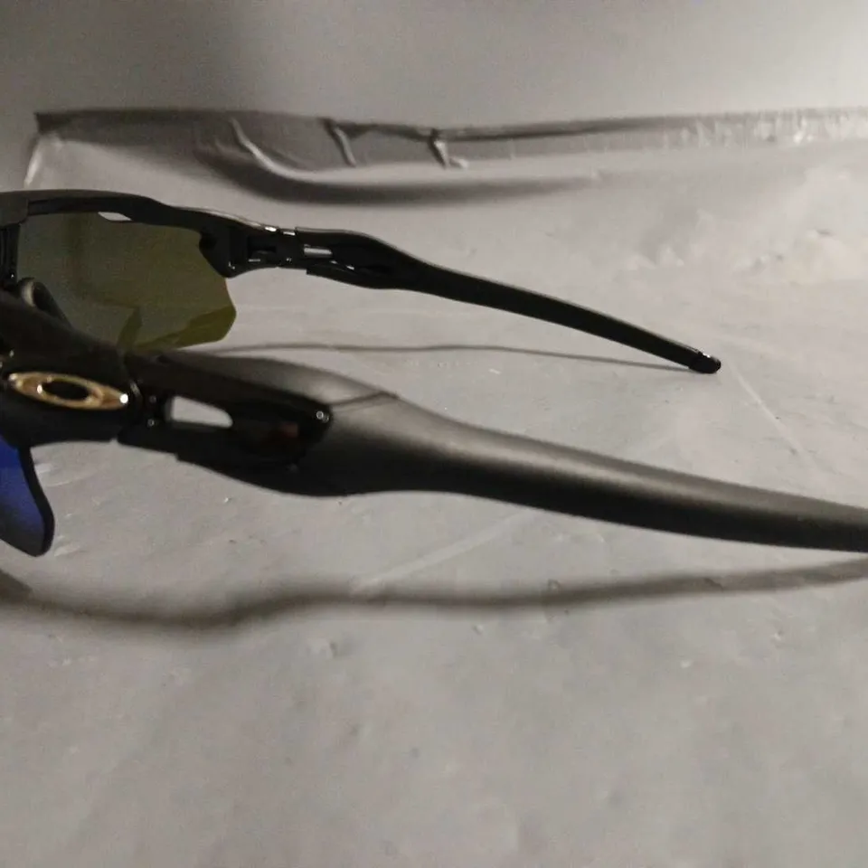 PAIR OF OAKLEY SPORTS STYLE GLASSES