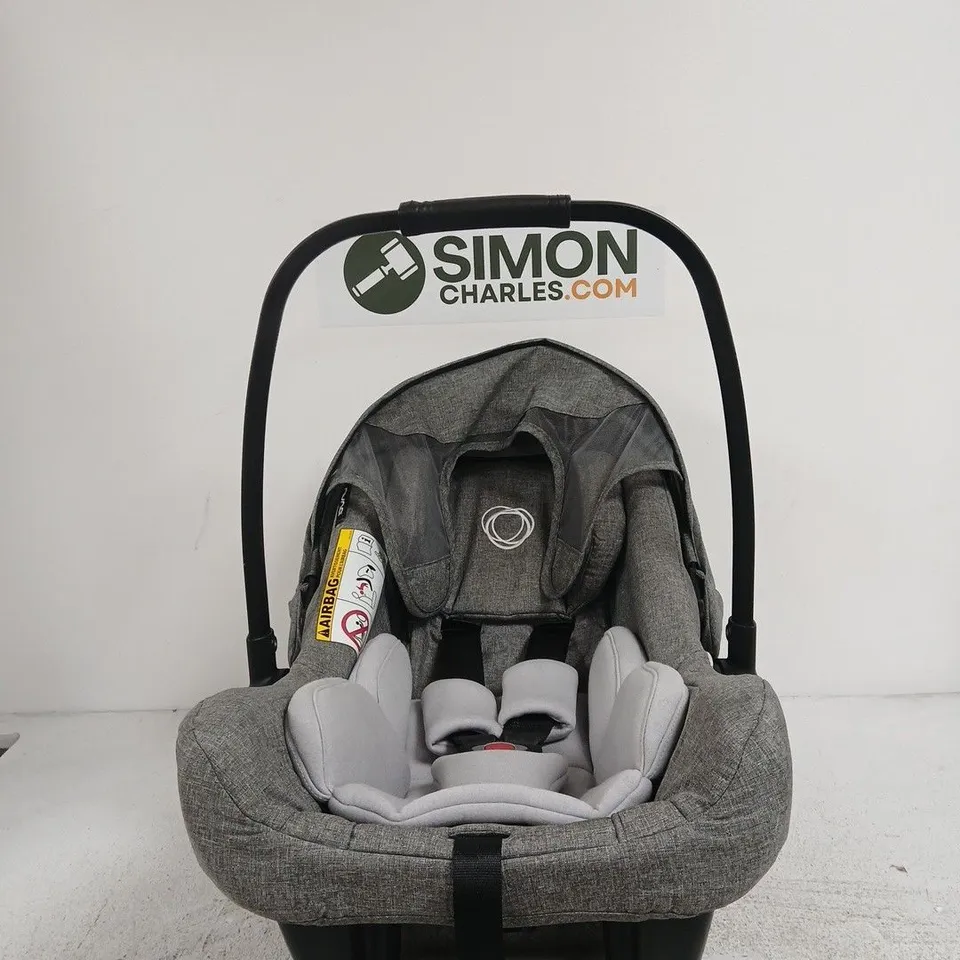 NUNA INFANT CAR SEAT – GREY FABRIC WITH ADJUSTABLE CARRY HANDLE