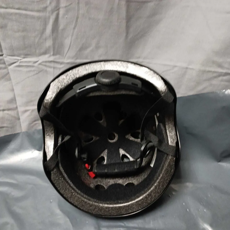 BOX OF APPROXIMATELY 6 MATTE BLACK CYCLING HELMET WITH INTERNAL PADDING AND ADJUSTABLE STRAP