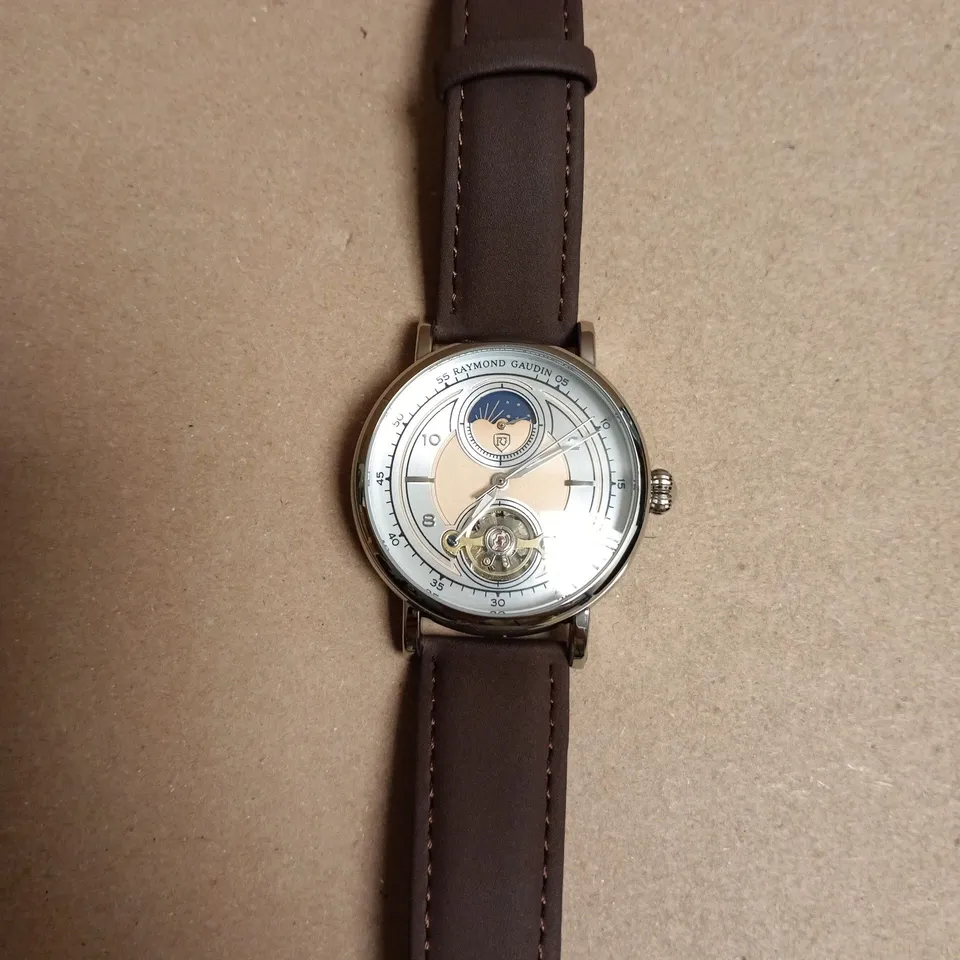 BOXED RAYMOND GAUDIN WRISTWATCH – STAINLESS STEEL CASE, BROWN LEATHER STRAP, EXHIBITION CASE BACK
