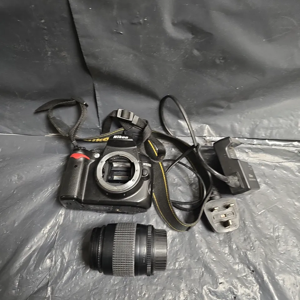 NIKON D5000 DIGITAL SLR WITH 35-80MM AF NIKKOR LENS, CHARGER AND STRAP - COLLECTION ONLY