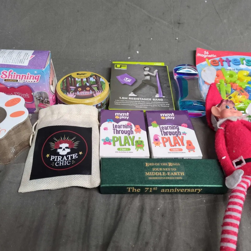 APPROXIMATELY 10 ASSORTED TOYS & GAMES PRODUCTS TO INCLUDE NAUGHTY ELF, PLAYING CARDS AND FRIDGE MAGNETS