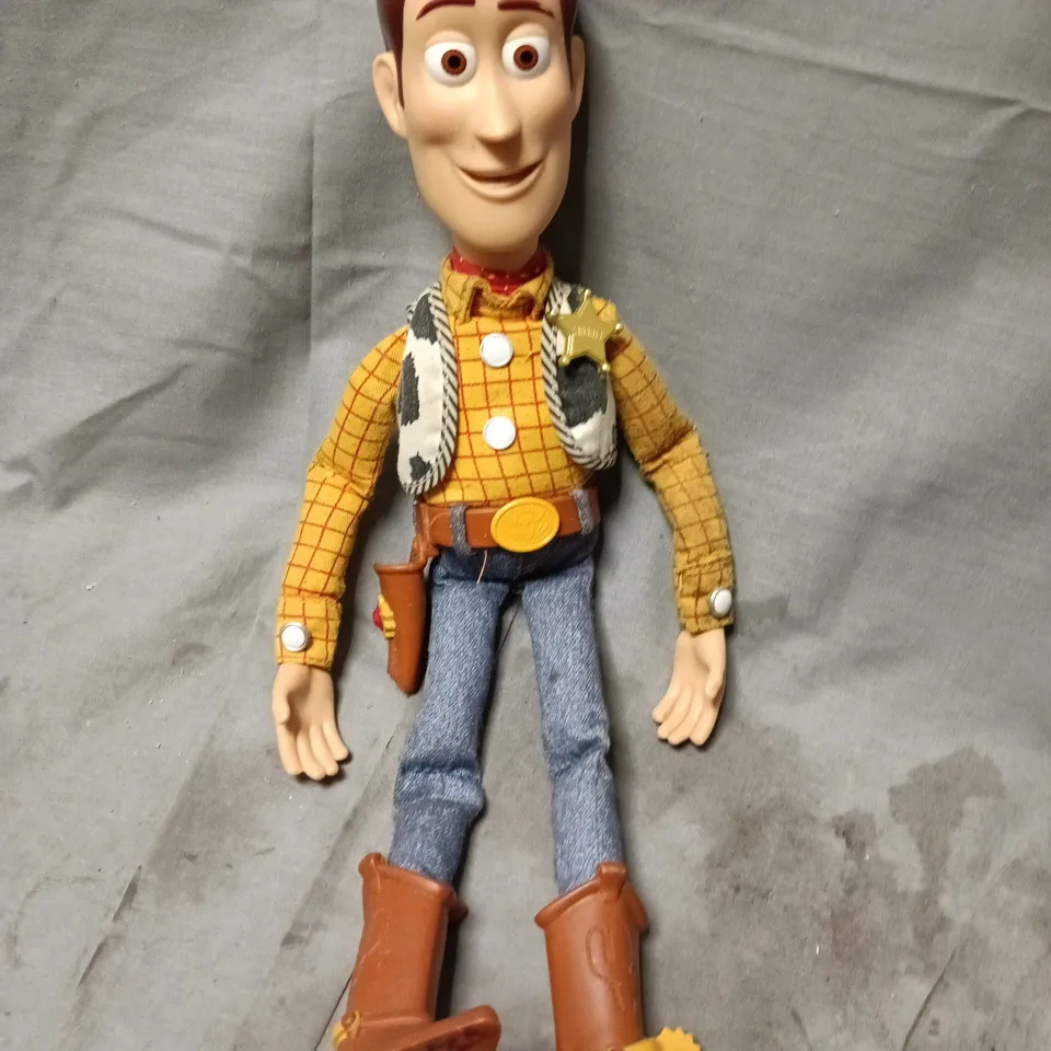WOODY FIGURE FROM TOY STORY – CLOTH VEST, YELLOW CHECKED SHIRT, DENIM JEANS & BROWN BOOTS