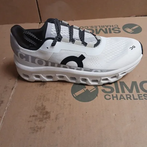 ON RUNNING WHITE TRAINERS WITH BLACK SPECKLED LACES – BOXED UK SIZE 9
