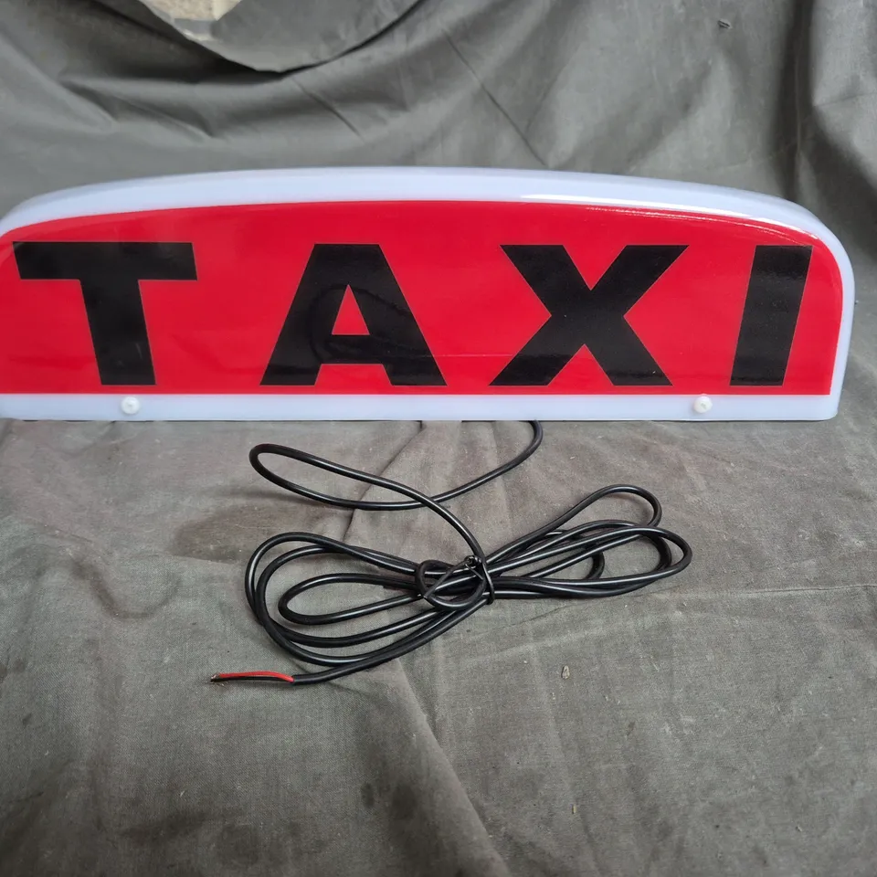 TAXI SIGN LIGHT – TAXI ON RED BACKGROUND, WHITE FRAME (SHOP FITTINGS)