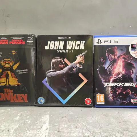 APPROXIMATELY 25 ASSORTED DVDS AND VIDEO GAMES FOR VARIOUS CONSOLES TO INCLUDE TEKKEN 8, JOHN WICK CHAPTERS 1-4, THE MONKEY, ETC