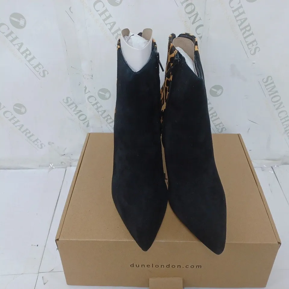 BOXED PAIR OF DUNE HEELED BOOTS IN LEOPARD SIZE 7 
