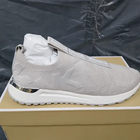 BOXED PAIR OF MICHAEL KORS BODIE SLIP ON TRAINERS - UK SIZE UNSPECIFIED