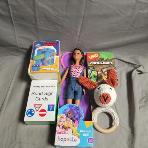 TOTEO OF APPROX 10 ASSORTED TOYS AND GAMES TO INCLUDE UNO, CARDS GAMES AND BABY RATTLE 