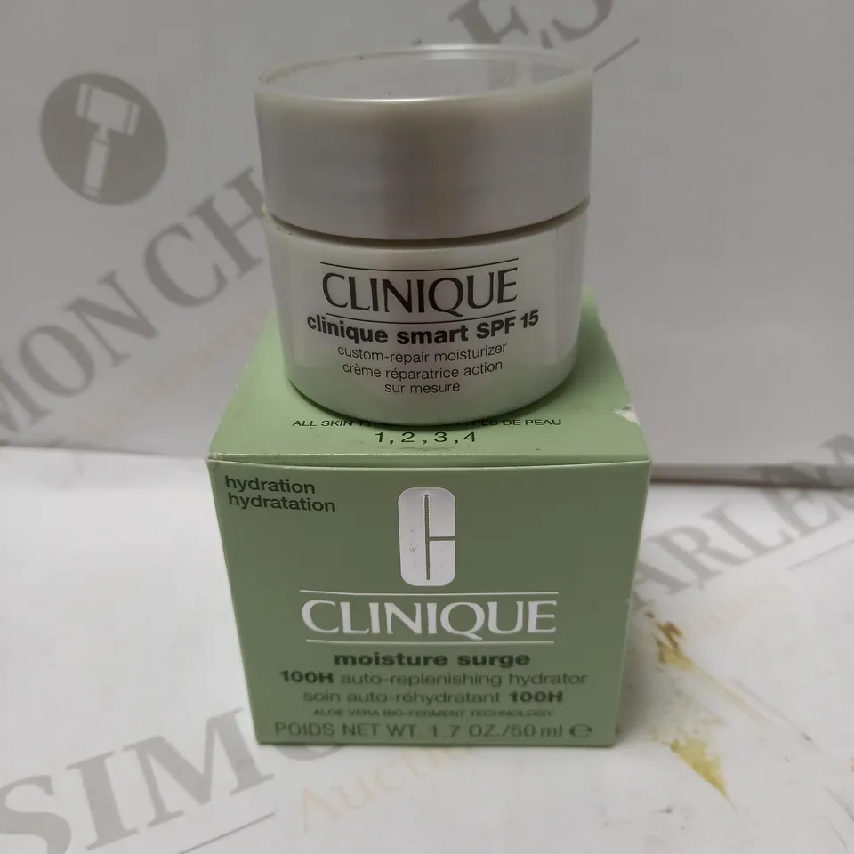 LOT OF 2 CLINIQUE PRODUCTS TO INCLUDE MOISTURE SURGE HYDRATOR 50ML & SMART CUSTOM REPAIR MOISTURISER 15ML