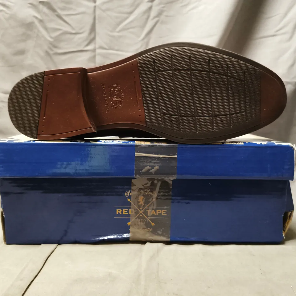 BOXED PAIR OF RED TAPE LOAFERS IN BROWN SIZE UK 10