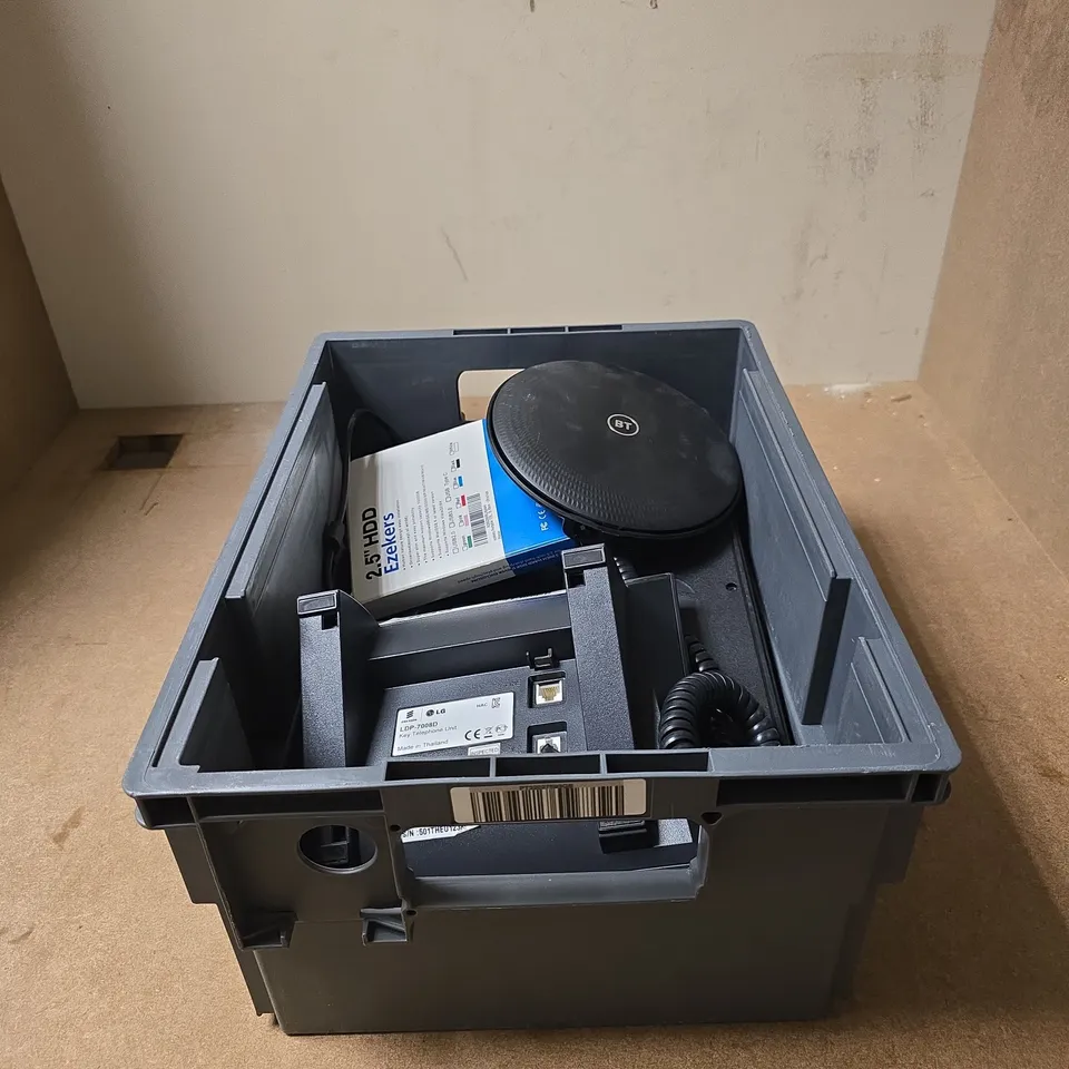 TOTE OF APPROXIMATELY 12 ASSORTED ITEMS TO INCLUDE LG IPECS LANDLINE TELEPHONE, BT HUB, EXTERNAL HARD DRIVE, WESTERN DIGITAL 2TB HARD DRIVE, HP 2013 ULTRASLIM DOCKING STATION ETC