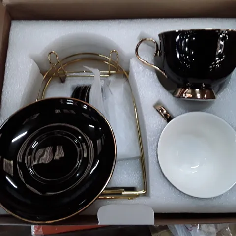 BOXED DUJUSY 4-PIECE CUP AND SAUCER SET
