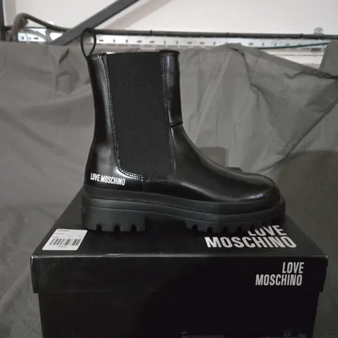 BOXED PAIR OF MOSCHINO LEATHER BOOTS - SIZE 38