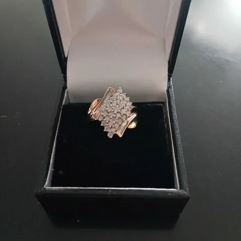 9CT GOLD DRESS RING SET WITH NATURAL ROUND AND BAGUETTE DIAMONDS