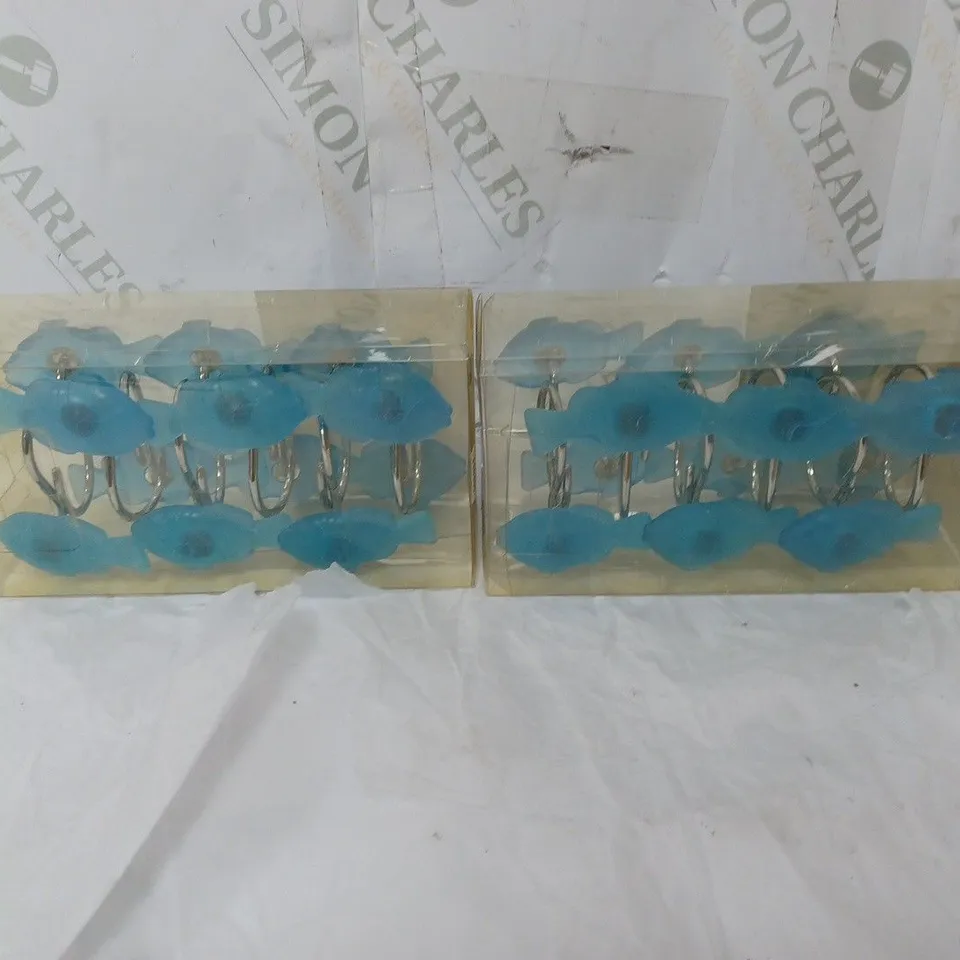 BOX OF APPROXIMATELY 15 HOMEBASE SHOWER CURTAIN RINGS BLUE FISH 
