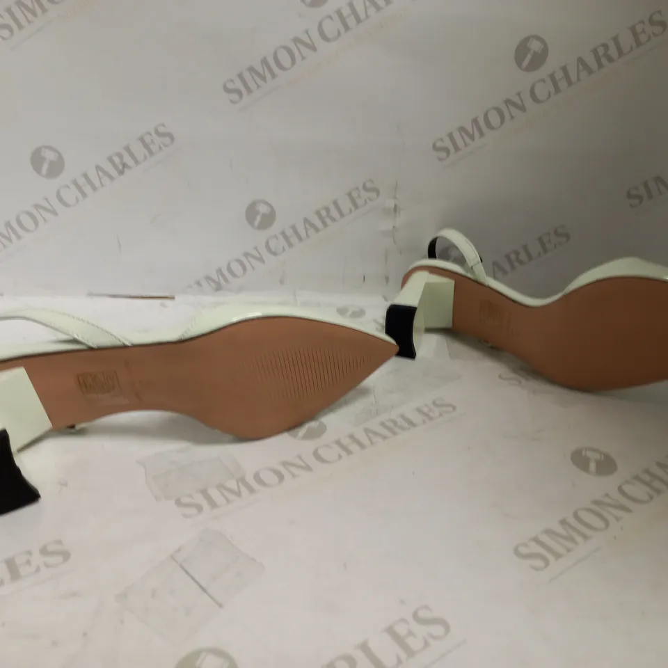 RAID WIDE FIT ENRIQUE MID HEEL SHOES IN WHITE 