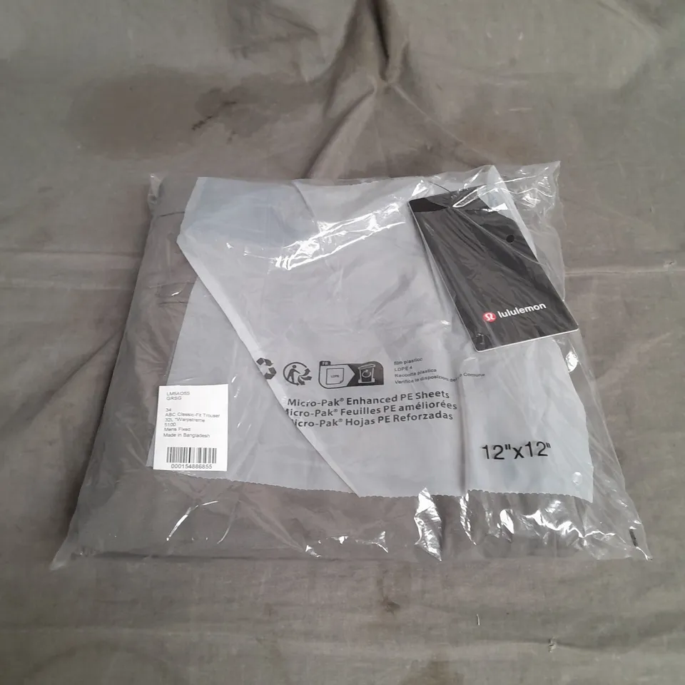 BAGGED LULULEMON ABC CLASSIC FIT WARPSTREME TROUSER IN GREY SAGE SIZE 34W 32L