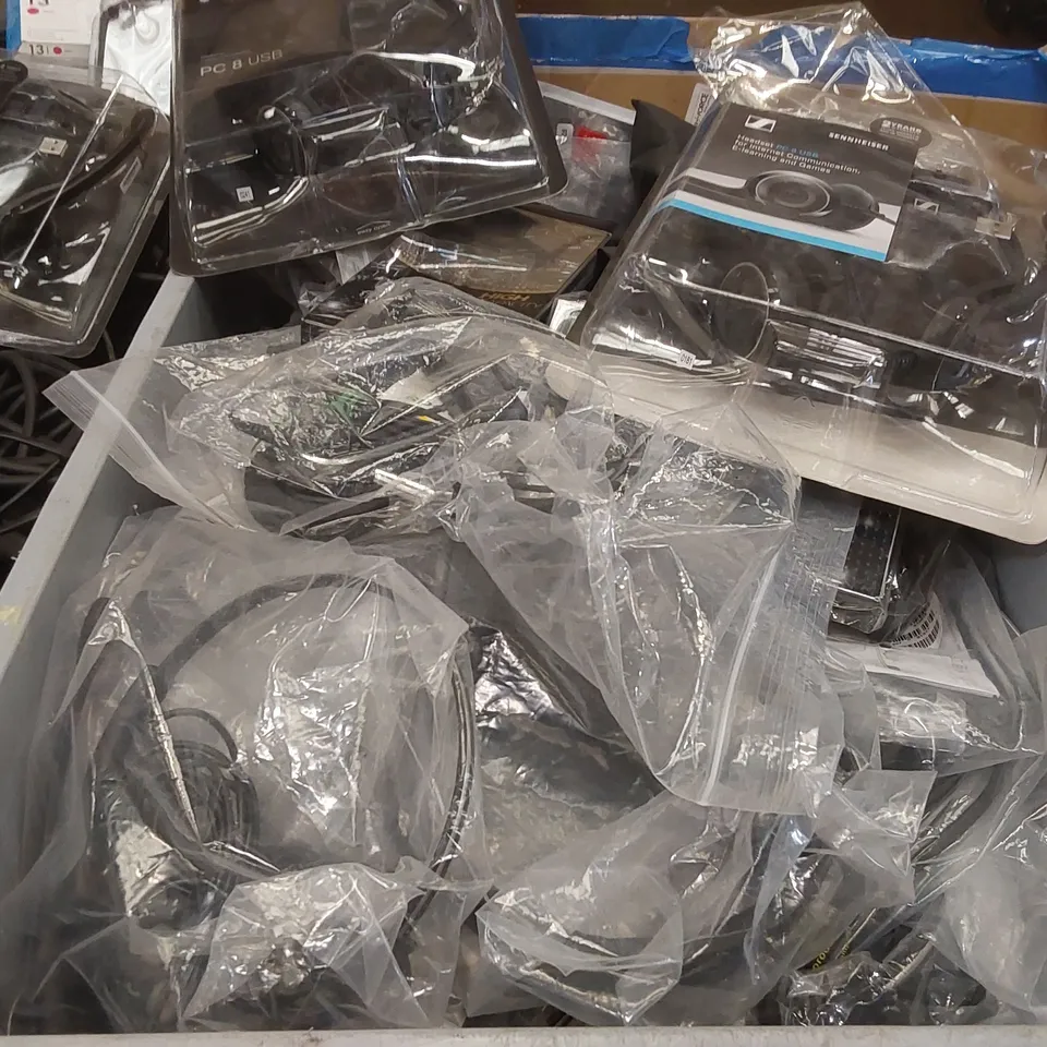 PALLET CONTAINING A LARGE ASSORTMENT OF OFFICE SUPPLIES INCLUDING: HEADSETS, ASSORTED WIRES/POWER CABLES, CANON/HP INK CARTRIDGES ECT