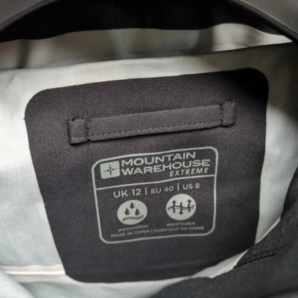 MOUNTAIN WAREHOUSE EXTREME WATERPROOF JACKET – UK 12, BLACK WITH TEAL ZIPS