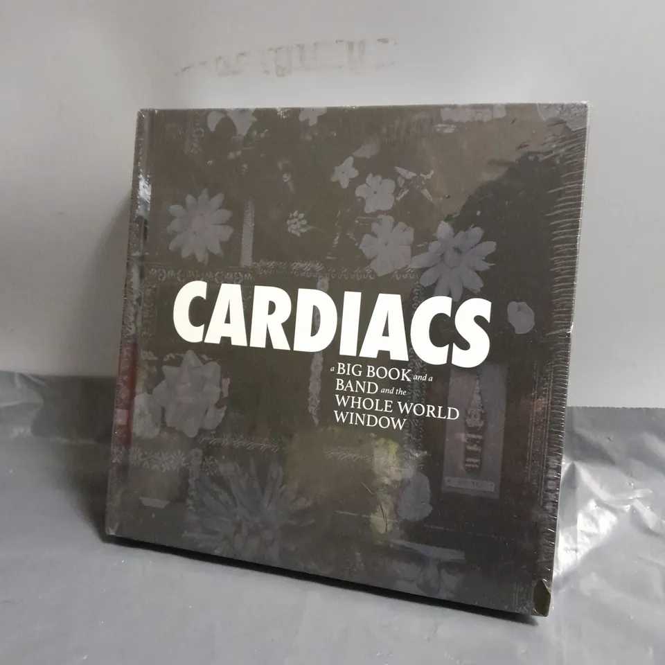 SEALED CARDIACS: A BIG BOOK AND A BAND AND THE WHOLE WORLD WINDOW