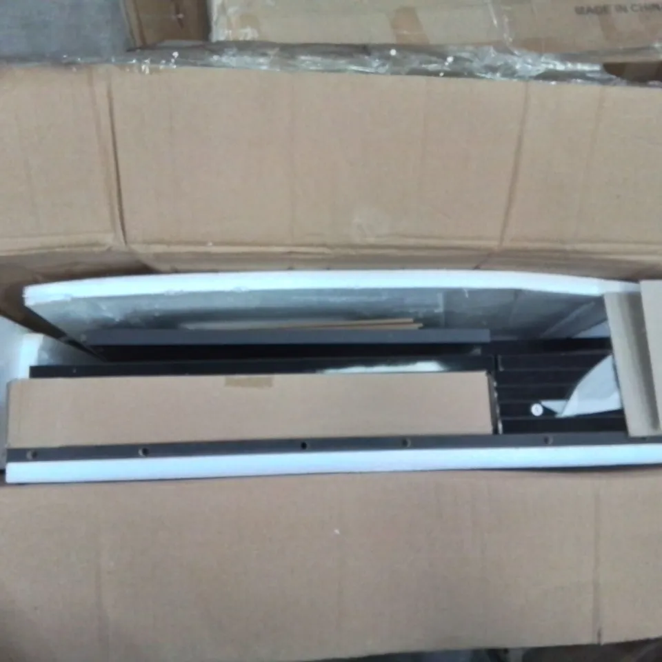 A BOXED 3 TIER CHEST OF BEDSIDE DRAWERS IN BLACK