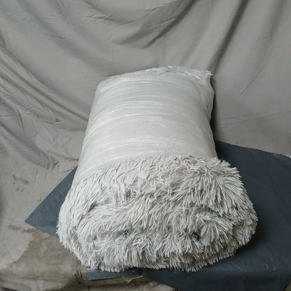 GREY THROW IN PINK CARRY BAG