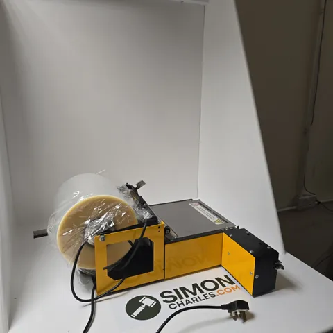 DESK TOP YELLOW PACKAGING/SEALING MACHINE WITH ROLLER