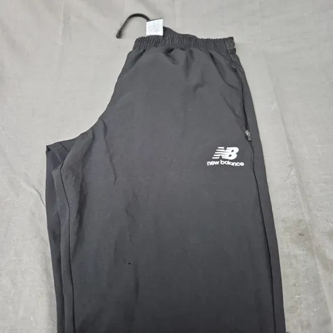 NEW BALANCE WIND BREAKER PANTS - SIZE M