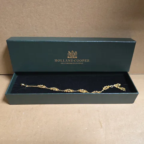 BOXED HOLLAND COOPER FONE HERALDIC HC BRACELET IN VINTAGE GOLD COLOUR